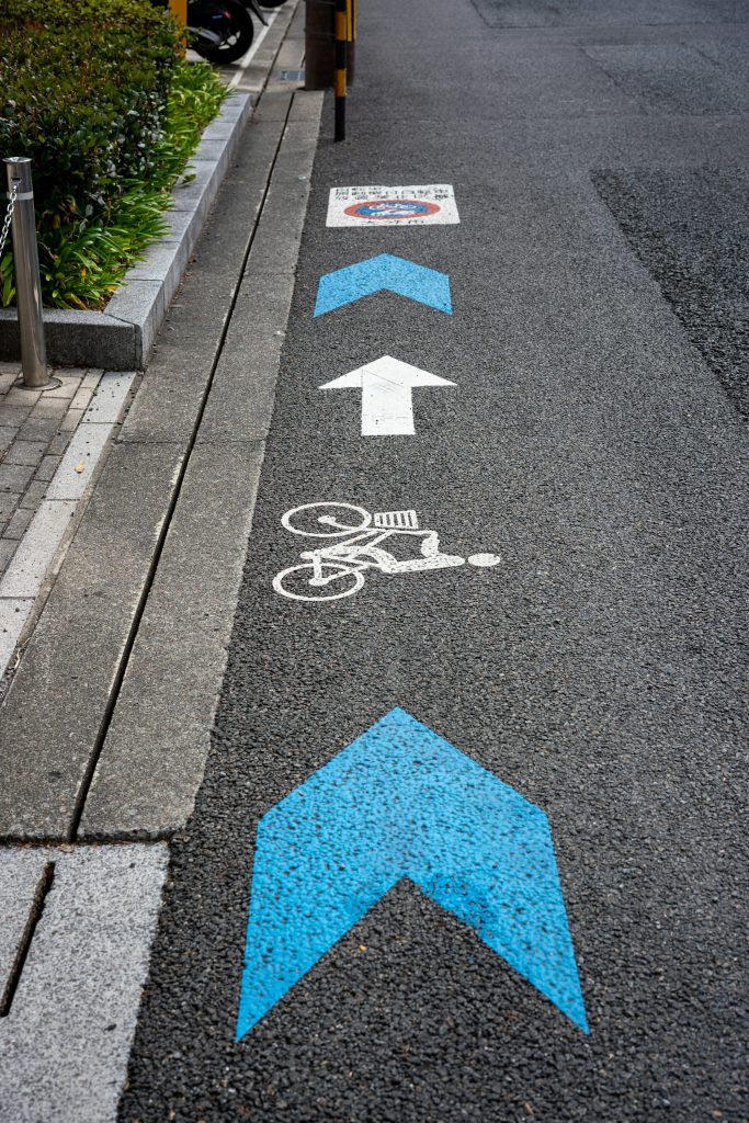 Painted bicycle lane symbol on a city street